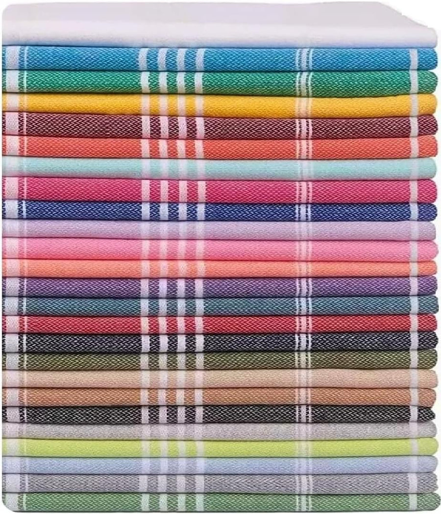 A tall stack of approximately 20 folded flat-woven towels in a wide variety of colors, each featuring white stripe accents near the edges. Colors include white, teal, yellow, red, green, pink, blue, purple, coral, dark gray, beige, olive, and light green.