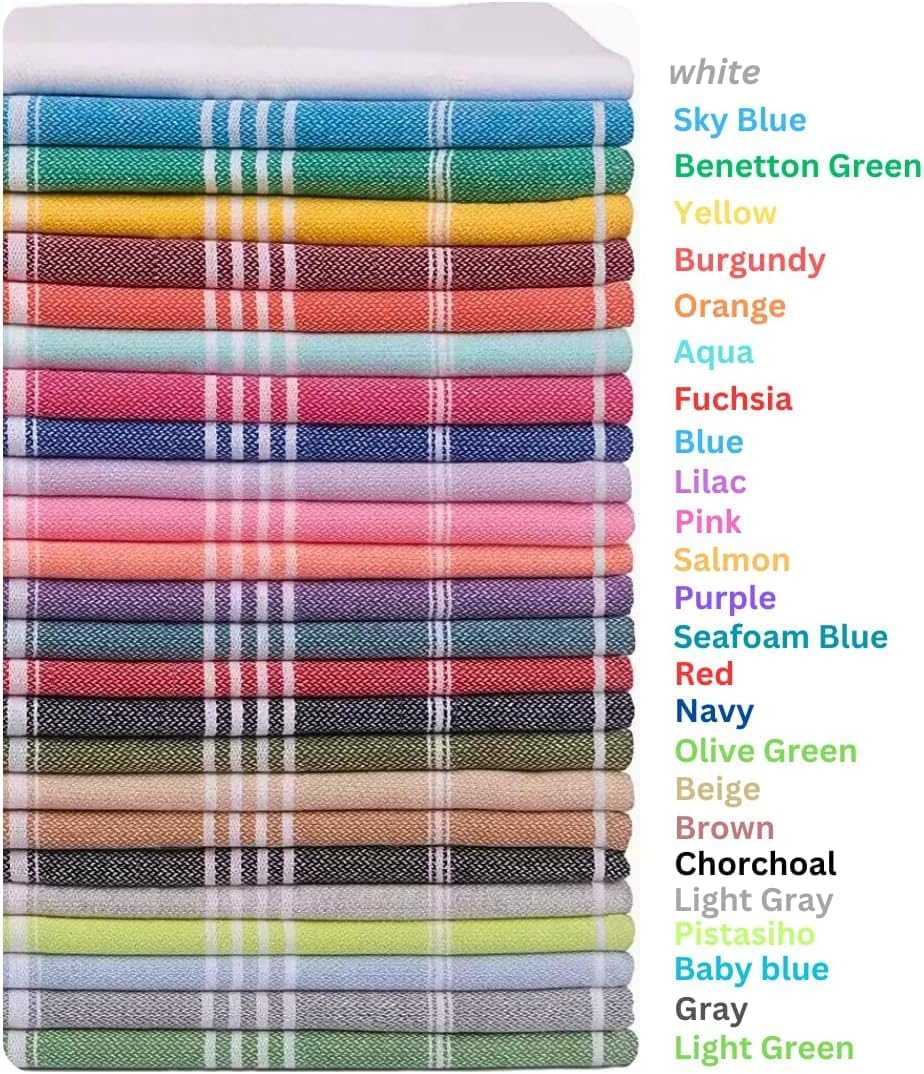 Stack of folded Turkish towels in 25 color options, each with white stripe accents on a woven textured fabric. Color names listed beside the stack from white and sky blue at top to gray and light green at bottom.